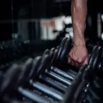 young-man-in-sportswear-an-exercise-class-in-a-gym_1150-12372